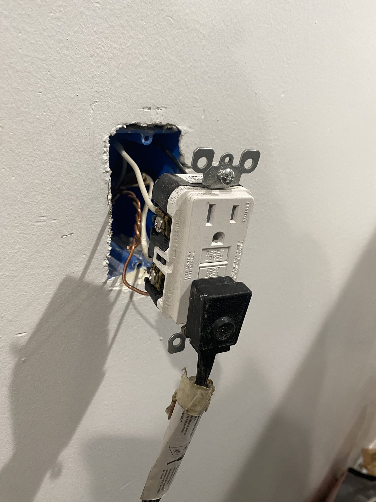 Completed double-gang outlet with GFCI and standard duplex socket